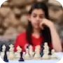 Photo of a woman playing chess